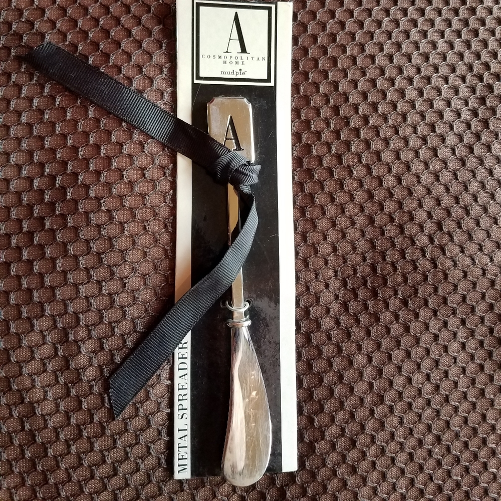 Initial A spreader